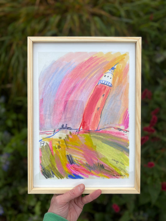 Framed colorful abstract painting held in front of a natural background