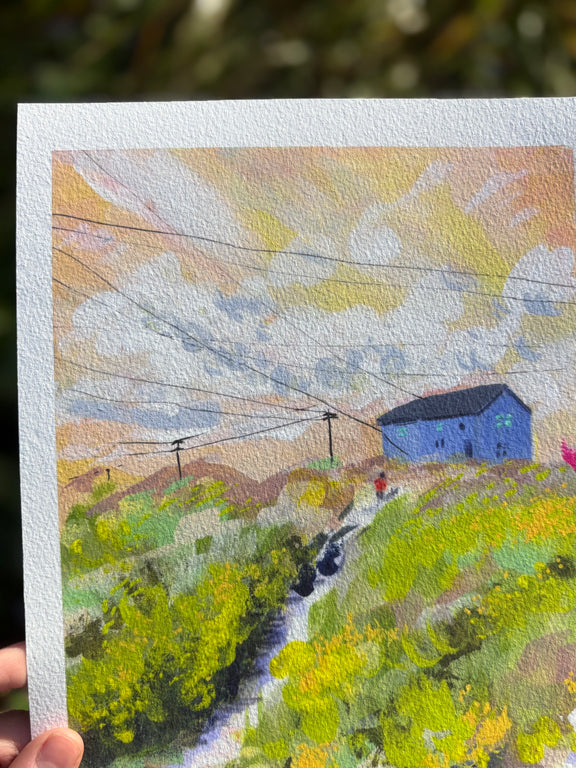 Painting of a blue house on a hill with a stream and greenery.